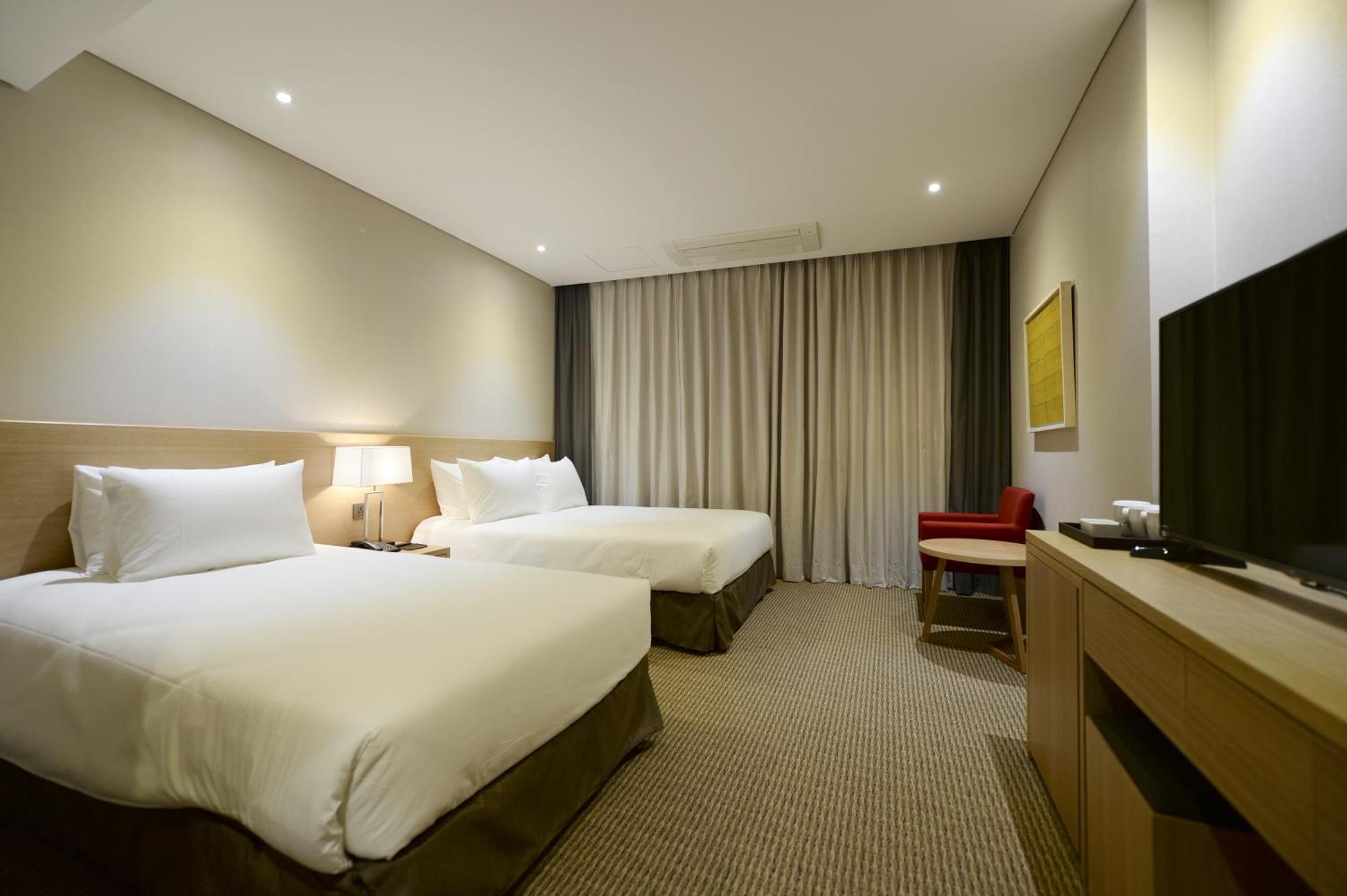 Hotel New Oriental Myeongdong Seul Quarto foto