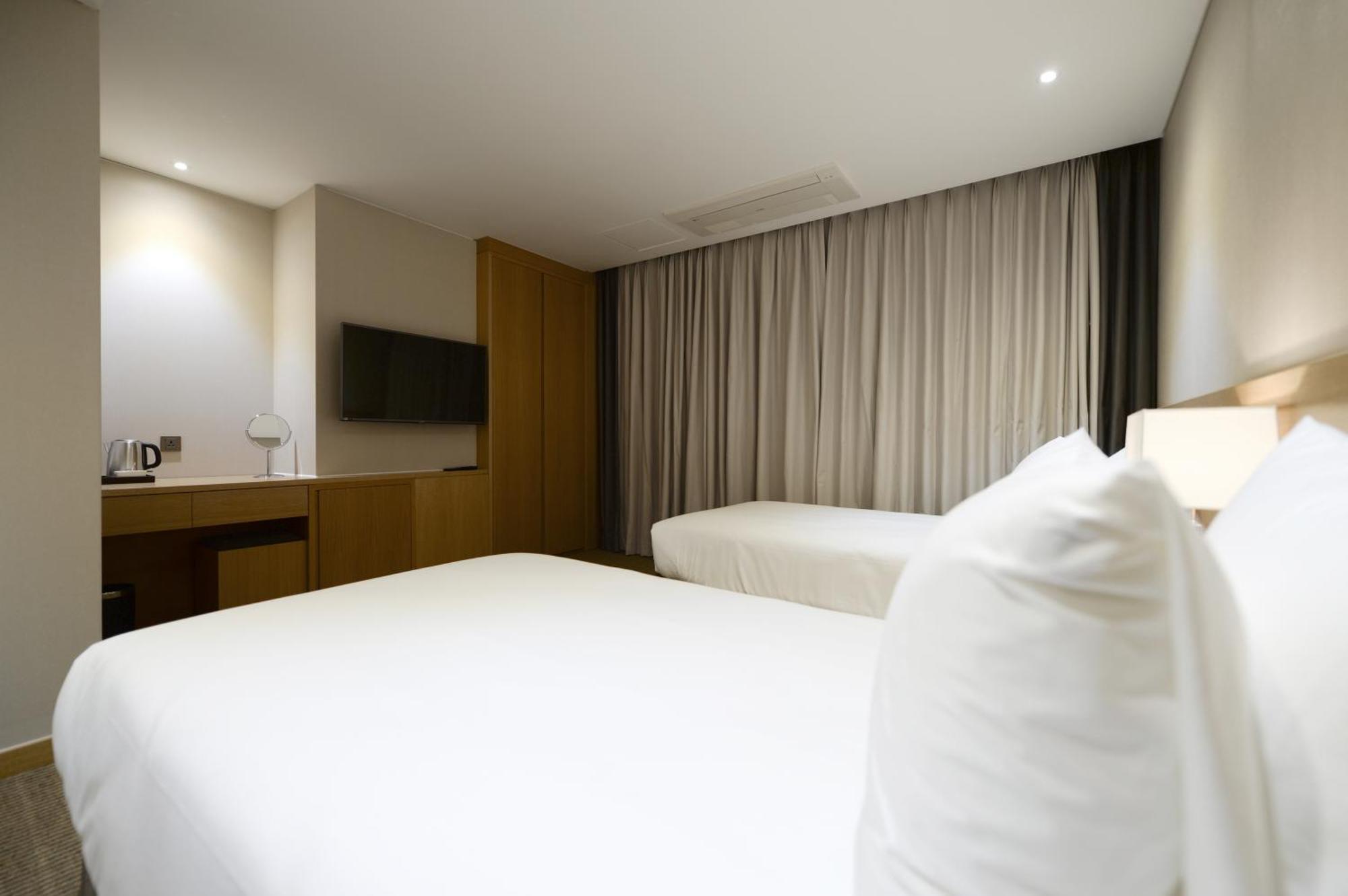 Hotel New Oriental Myeongdong Seul Quarto foto
