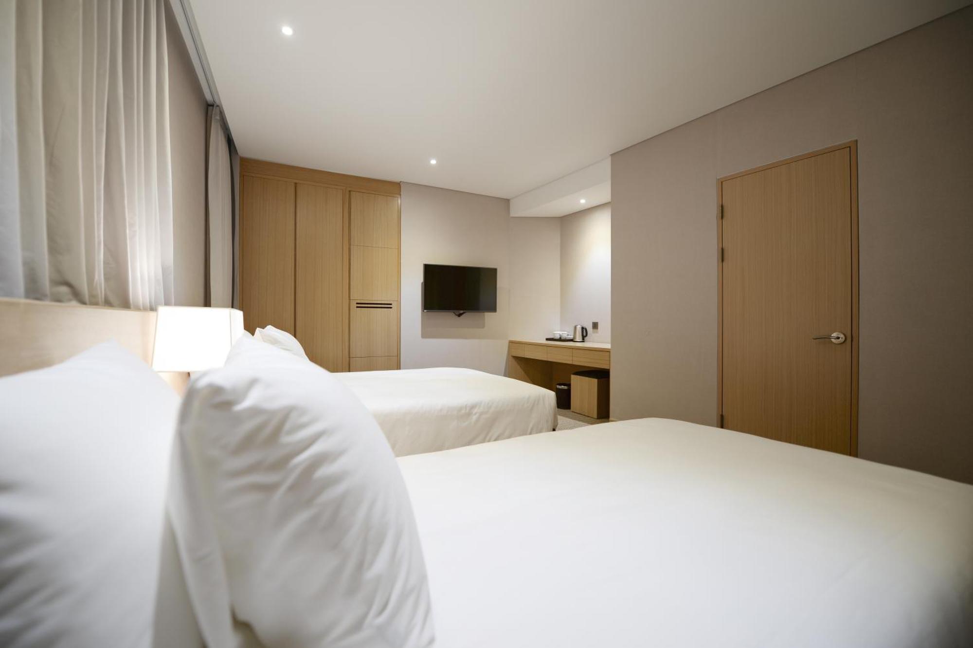 Hotel New Oriental Myeongdong Seul Quarto foto